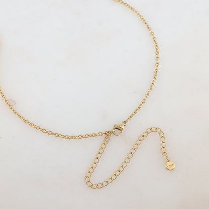 Sautoir avec un anneau et un pendentif rond ondulé effet miroir (80+10CM)