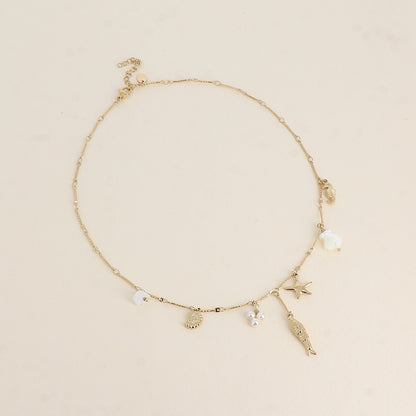 Collier - breloques du thème marin (perles de résine, étoile de mer, poisson, coquillages et hippocampe) 40+5 cm