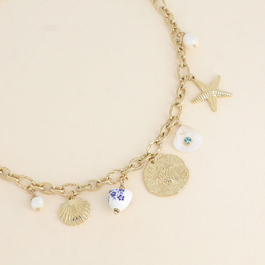 Collier - pendentifs (résine, coquillage, cœur en céramique émaillée fleurie, tortue, nacre, perle d'eau douce) 40+5 cm