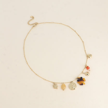 Collier - pendentifs (pierres naturelles, scarabée, soleil, trèfle en résine léopard, trèfle) 40+5 cm