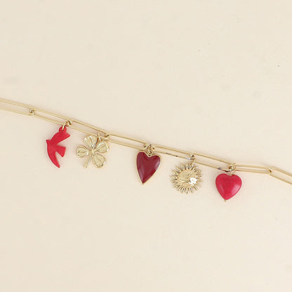 Bracelet - pendentifs (cœur martelé, oiseau en résine, cœur en émail, fleur, cœur en pierre naturelle) (17+3 cm)