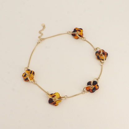 Collier - 5 fleurs de résine - Léopard 40+5 cm