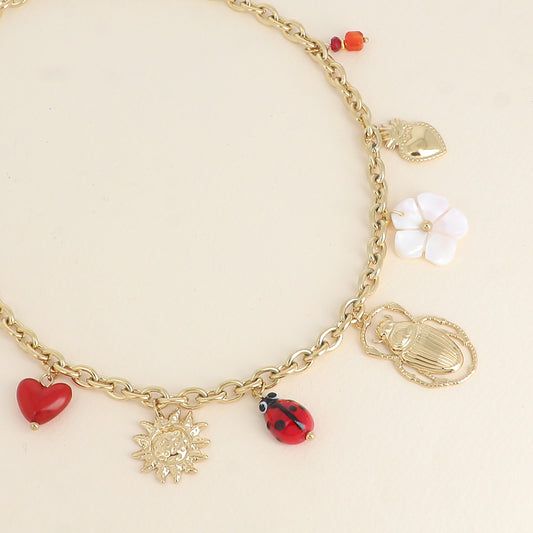 Collier - soleil, coccinelle en céramique émaillée, scarabée, fleur nacrée, cœurs 40+5 cm