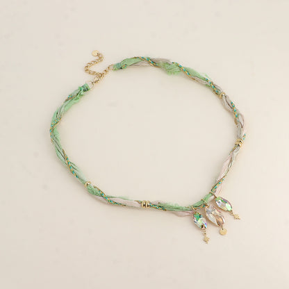 Collier sur tissu et chaîne - orné de 3 cristaux de Swarovski® - Golden shadow
