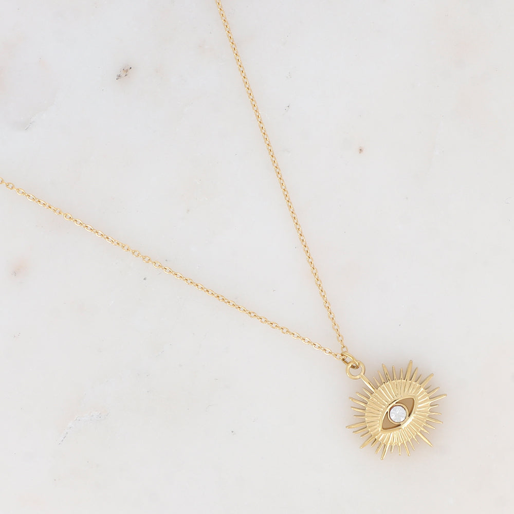 Collier doré avec pampille graphique ajourée avec œil strassé 38+7 cm
