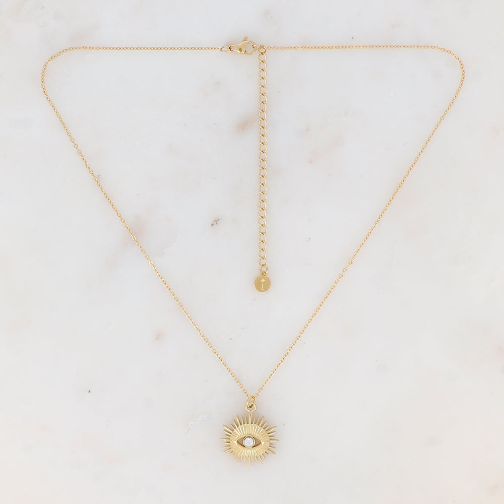 Collier doré avec pampille graphique ajourée avec œil strassé 38+7 cm