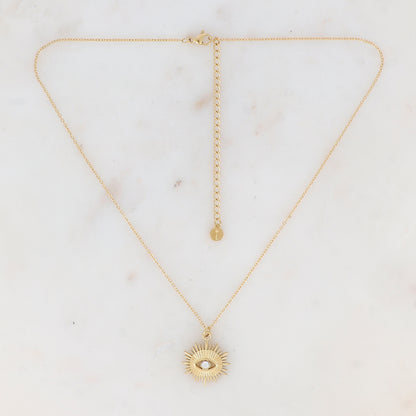 Collier doré avec pampille graphique ajourée avec œil strassé 38+7 cm