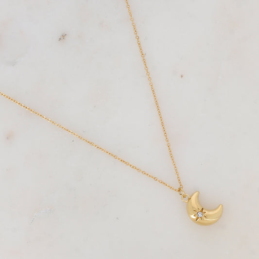 Collier doré avec pampille forme lune ornée d'une étoile strassé 38+7 cm