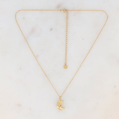 Collier doré avec pampille forme lune ornée d'une étoile strassé 38+7 cm