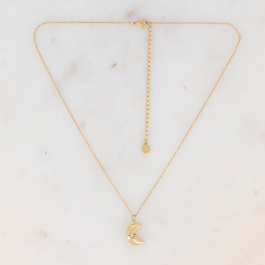 Collier doré avec pampille forme lune ornée d'une étoile strassé 38+7 cm