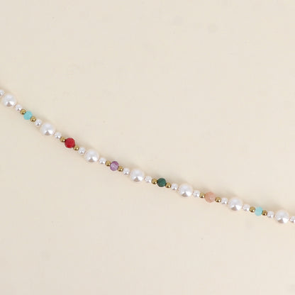 Bracelet sur fil - perles de résine, pierres naturelles et perles métalliques (16+3 cm)