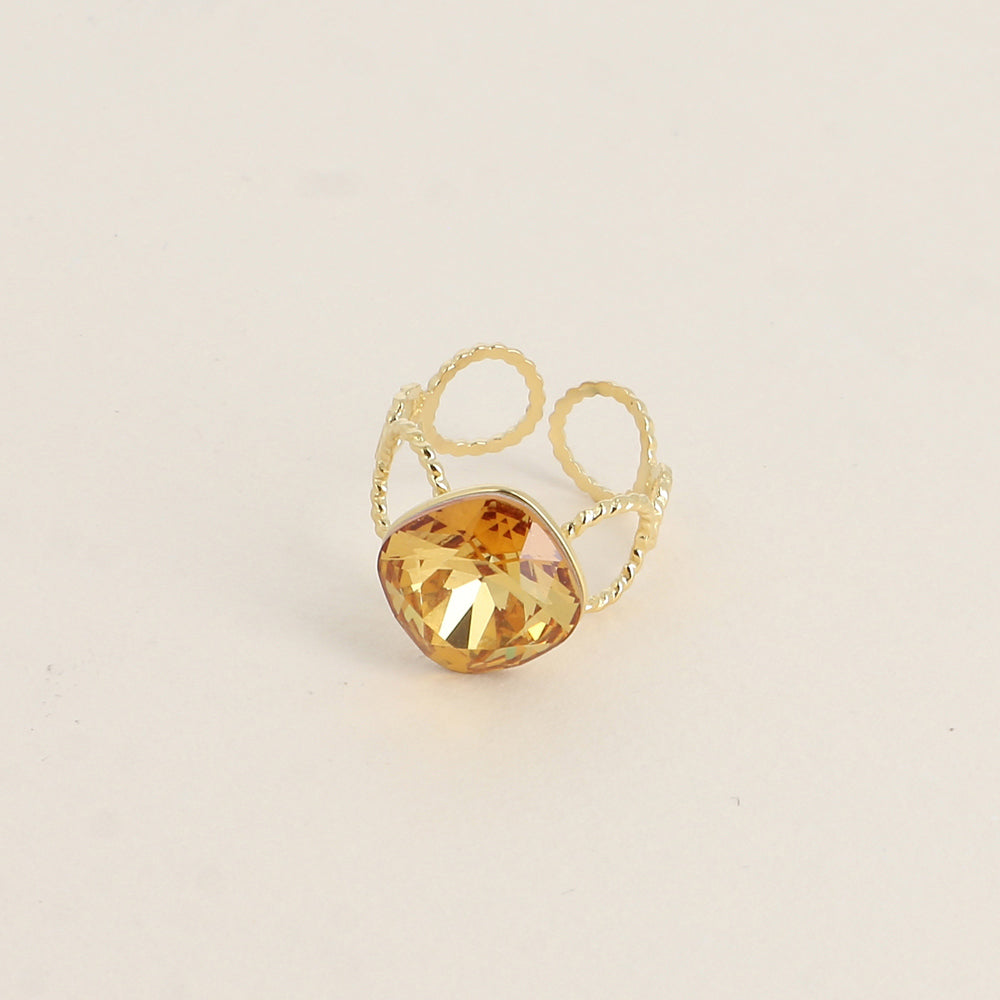 Bague - anneau aux cercles striés et orné de cristaux de Swarovski® - Golden topaz