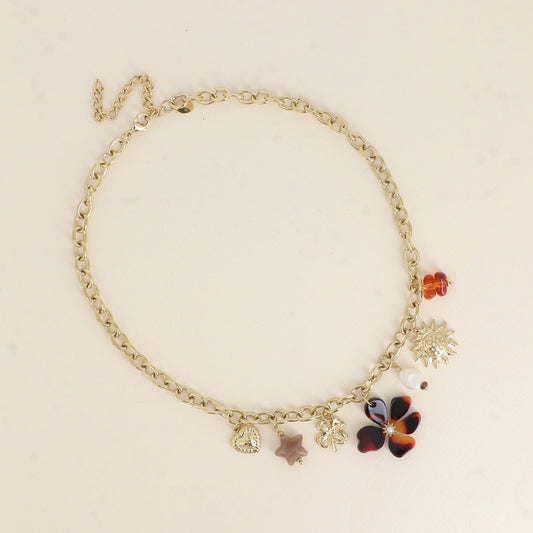 Collier - pendentifs (soleil, perle d'eau douce, trèfle, étoile et fleur en résine, cœur) 40+7 cm