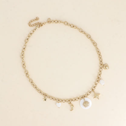 Collier - breloques (nacre, étoile, cœur, lune, soleil, perles d'eau douce) 40+7 cm
