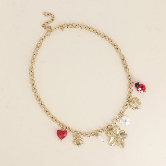 Collier - pendentifs (fleur, coccinelle en résine, fleur nacrée, cœur, soleil) 40+7 cm