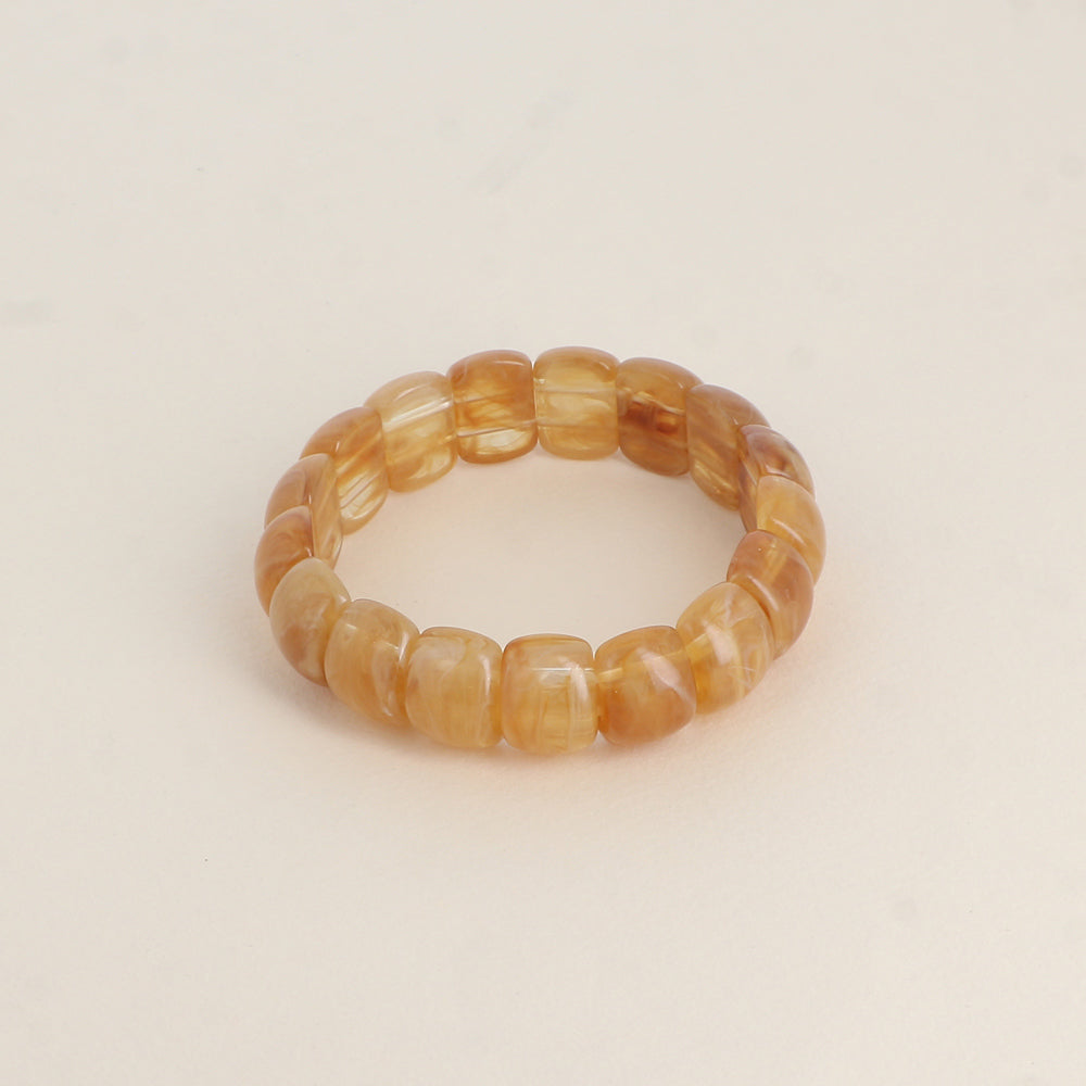 Bracelet élastique - perles en résine Dimensions intérieures du bracelet : 5,5 x 5,5 cm - Epaisseur : 15 mm