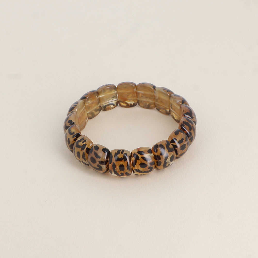 Bracelet élastique - perles en résine Dimensions intérieures du bracelet : 5,5 x 5,5 cm - Epaisseur : 15 mm