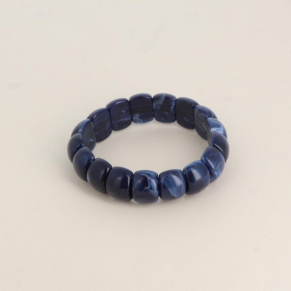 Bracelet élastique - perles en résine Dimensions intérieures du bracelet : 5,5 x 5,5 cm - Epaisseur : 15 mm