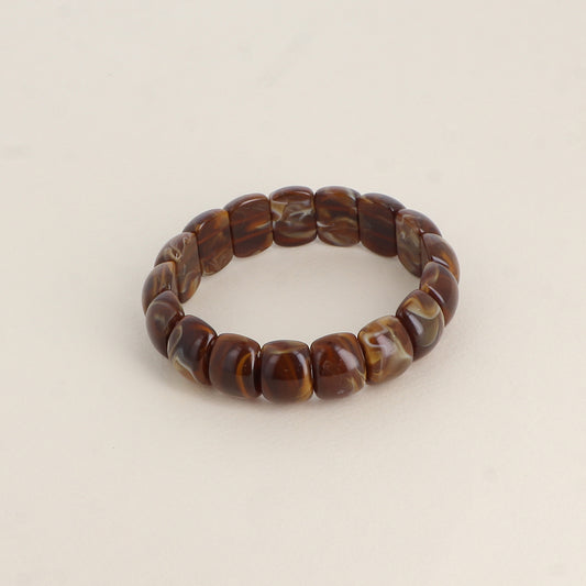 Bracelet élastique - perles en résine Dimensions intérieures du bracelet : 5,5 x 5,5 cm - Epaisseur : 15 mm