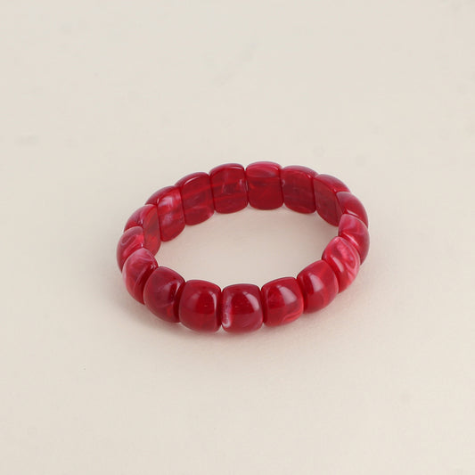 Bracelet élastique - perles en résine Dimensions intérieures du bracelet : 5,5 x 5,5 cm - Epaisseur : 15 mm