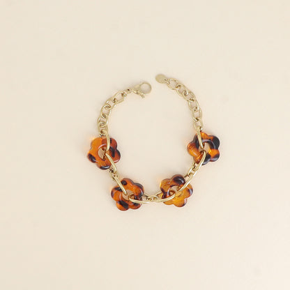Bracelet - 4 fleurs en résine léopard et maillons ovales (17+3 cm / dimension approximative d'une fleur: 20 x 20 mm)