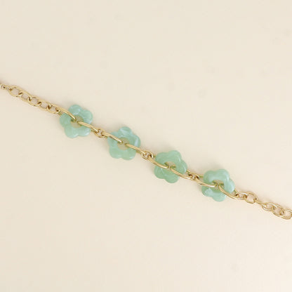 Bracelet - 4 fleurs en résine verte et maillons ovales (17+3 cm / dimension approximative d'une fleur: 20 x 20 mm)