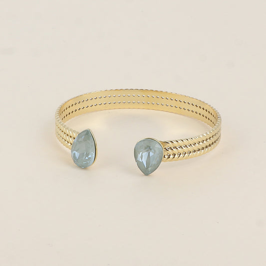 Jonc - anneau tressé orné de 2 cristaux de Swarovski® en forme de goutte - Agave ignite - Dimensions intérieures : 58 x 48 mm Epaisseur du jonc : 8 mm