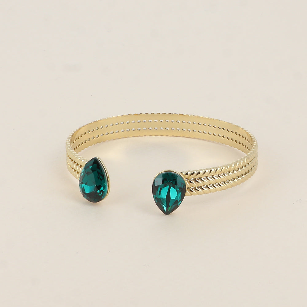 Jonc - anneau tressé orné de 2 cristaux de Swarovski® en forme de goutte - Emerald - Dimensions intérieures : 58 x 48 mm Epaisseur du jonc : 8 mm