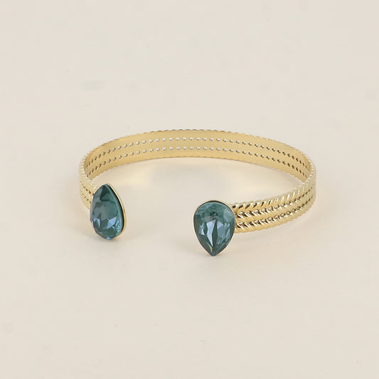 Jonc - anneau tressé orné de 2 cristaux de Swarovski® en forme de goutte - Pine green ignite - Dimensions intérieures : 58 x 48 mm Epaisseur du jonc : 8 mm