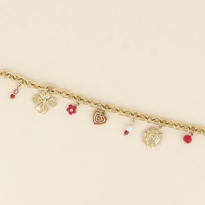 Bracelet - breloques soleil, cœur, trèfle et perles (17+3 cm)