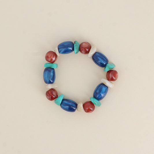 Bracelet élastique - perles en résine bleue