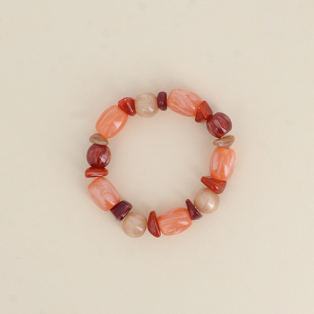 Bracelet élastique - perles en résine corail