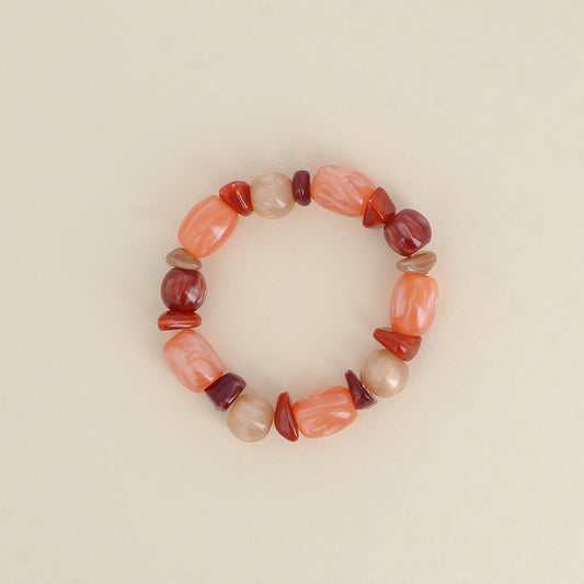 Bracelet élastique - perles en résine corail