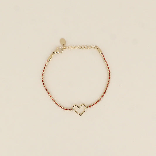 Bracelet - fil tressé rouge, pendentif cœur ajouré (16+3 cm)
