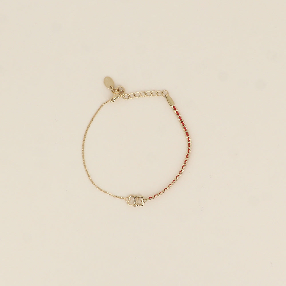Bracelet - fil tressé rouge, pendentif double trèfle ajouré (16+3 cm)