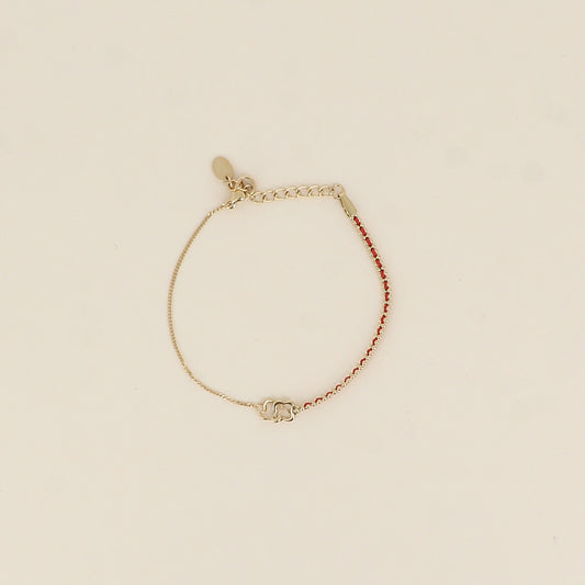 Bracelet - fil tressé rouge, pendentif double trèfle ajouré (16+3 cm)