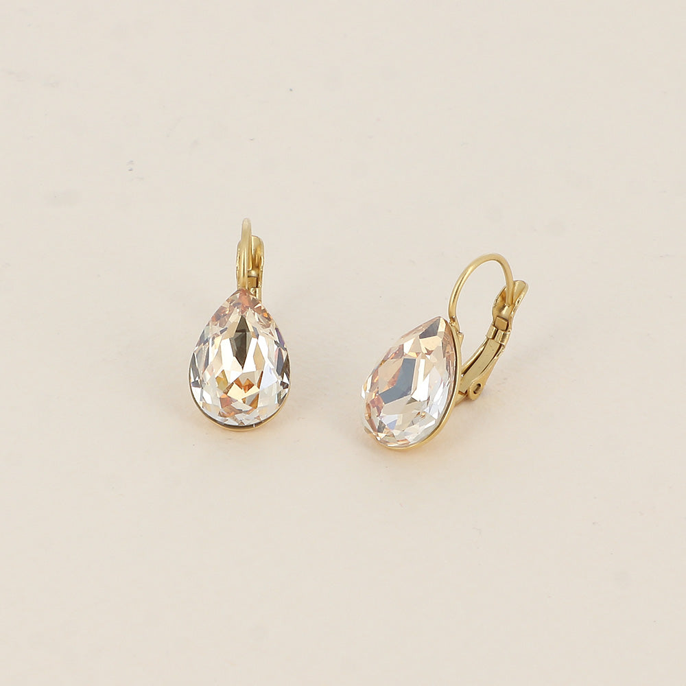 Boucles dormeuses ornées de cristaux de Swarovski® - Dimensions de la boucle : 10 x 23mm - Dimensions du cristal : 10 x 13mm - Golden shadow