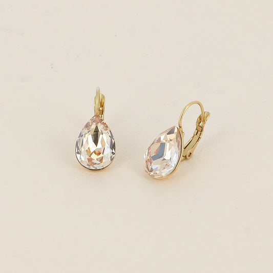 Boucles dormeuses ornées de cristaux de Swarovski® - Dimensions de la boucle : 10 x 23mm - Dimensions du cristal : 10 x 13mm - Golden shadow