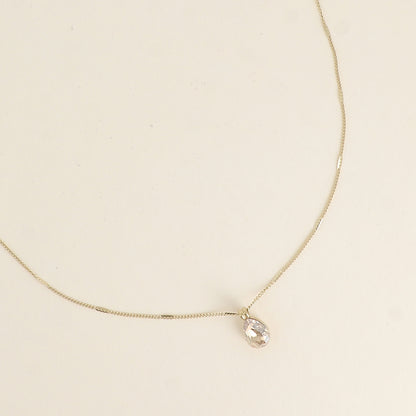 Collier orné de cristaux de Swarovski® en forme de goutte - Longueur de chaîne : 38+7 cm - Dimensions du cristal : 7x10 mm - Golden shadow