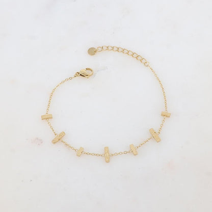 Bracelet avec 7 barres : 3 martelées et 4 lisses