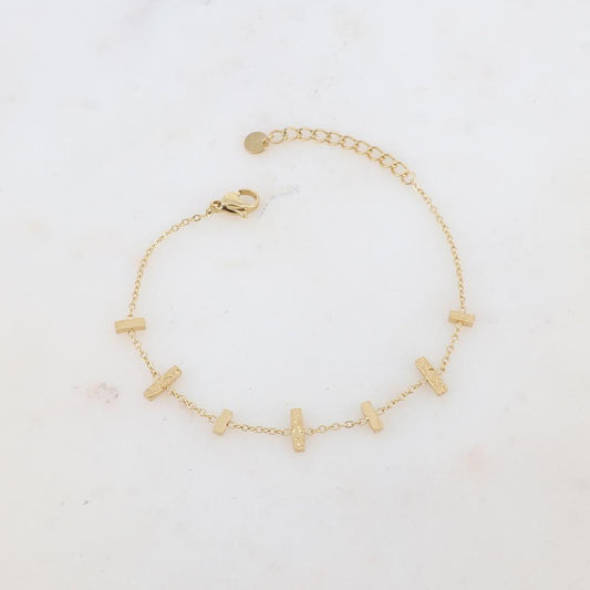 Bracelet avec 7 barres : 3 martelées et 4 lisses