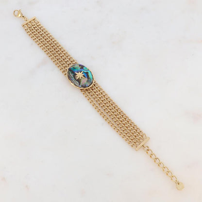 Bracelet en maille gourmette quatre rangs avec pièce ovale, nacre abalone et étoile gravée