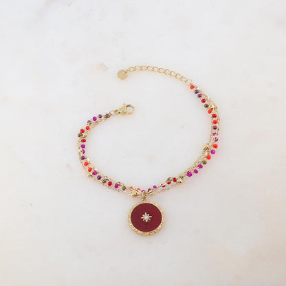 Bracelet trois rangs avec perles émaillées, petites boules, pièce ronde émaillée, étoile et strass