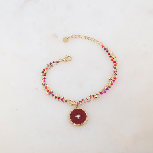 Bracelet trois rangs avec perles émaillées, petites boules, pièce ronde émaillée, étoile et strass