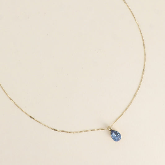 Collier orné de cristaux de Swarovski® en forme de goutte - Longueur de chaîne : 38+7 cm - Dimensions du cristal : 7x10 mm - Denim blue