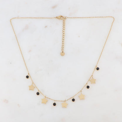Collier doré composé de pendants étoile et de strass noirs 40+5 cm