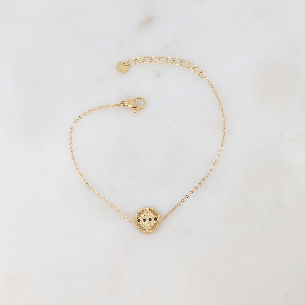 Bracelet avec pendentif rond ajouré de façon géométrique, 4 strass