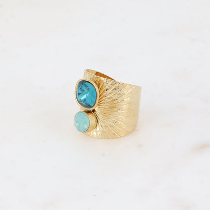 Bague large anneau solairement strié - Ornée de 2 cristaux de Swarovski® - Hauteur de la bague: 20mm - Dimensions des cristaux : 8x8 mm et 6x6 mm - Indicolite
