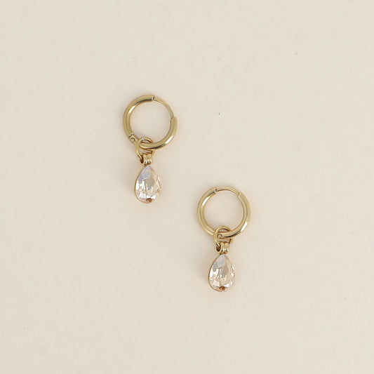 Créoles ornées de cristaux de Swarovski® en forme de gouttes - Dimensions de la créole : 13 x 13 x 2 mm - Dimensions de la boucle : 7 x 27 mm - Dimensions du cristal : 7 x 10 mm- Golden shadow