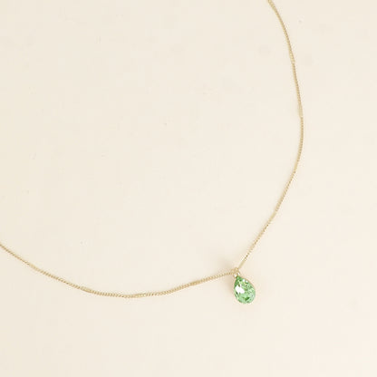 Collier orné de cristaux de Swarovski® en forme de goutte - Longueur de chaîne : 38+7 cm - Dimensions du cristal : 7x10 mm - Peridot